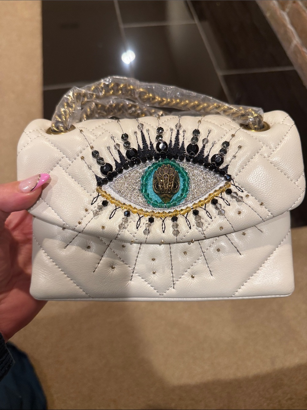 Karl Lagerfeld White Quilted Shoulder Bag with Embroidered Eye Motif
